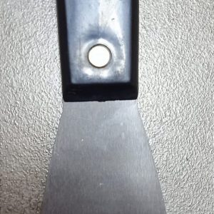 Espátula con mango de plástico 2" Corona